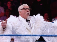Get a load of Ric Flair as KFC’s latest Colonel Sanders...in a feathered robe